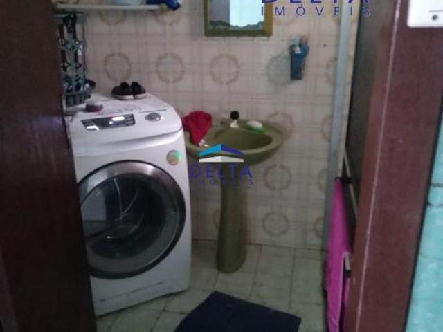 Terreno com 3 casas em Torres