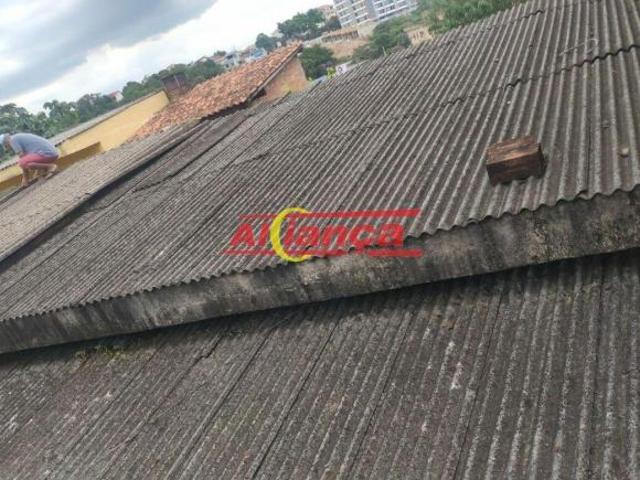 Terreno com 3 casas próximo ao Centro de Arujá