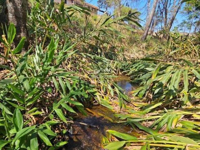 Terreno com água corrente e casa a venda em Rio Manso MG