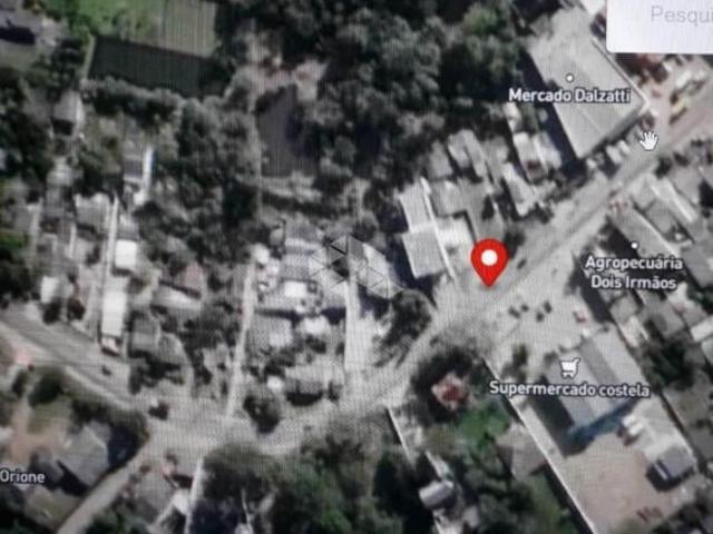 Terreno com cara de sitio de 3.630m com com casas, salões de frente para avenida