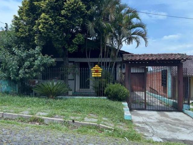 Terreno com casa mista