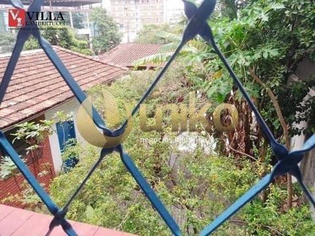 Terreno com casa no Santo Agostinho