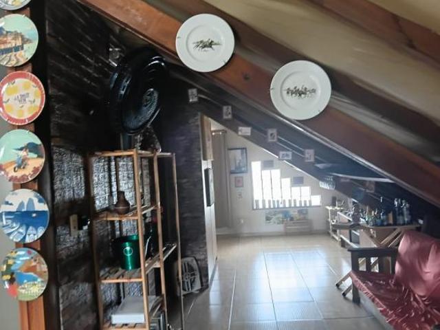 Terreno com casa antiga