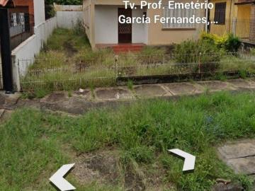 Terreno com casa antiga 3 dormitórios a venda bairro Passo da Areia de Porto Alegre