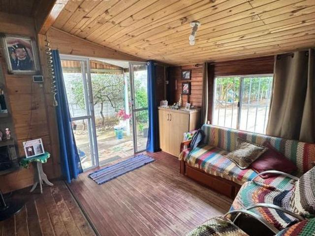 Terreno com casa de madeira, à venda por R$ 245.000,00 excelente localização em Gravataí/RS