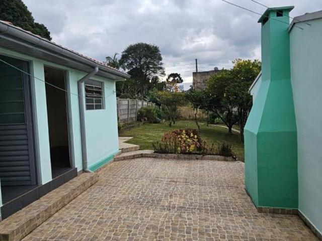 Terreno com casa em alvenaria