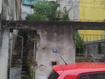 Terreno com casa habitável
