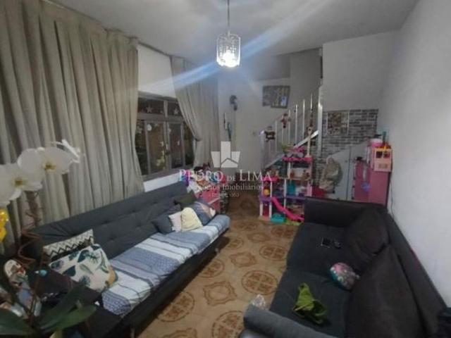 Terreno com casas e salão comercial na Penha