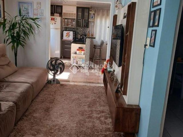 Terreno com duas casas muito bem localizado no Bairro Estância Velha