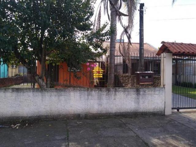 Terreno com duas casas de alvenaria