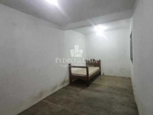Terreno com duas casas térreas e 1 vaga na Vila Marieta Penha