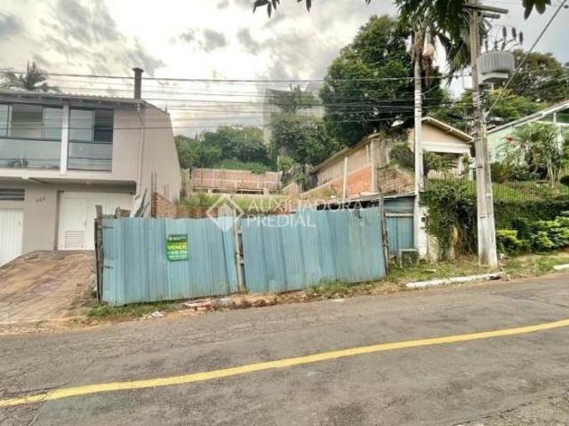 Casa 3 dormitórios sendo 1 suíte e 1 suíte americana Bairro Vila Nova Novo Hamburgo