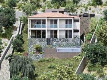 Terreno com projeto aprovado para moradia com dois apartamentos T2 | Machico, Porto da Cruz