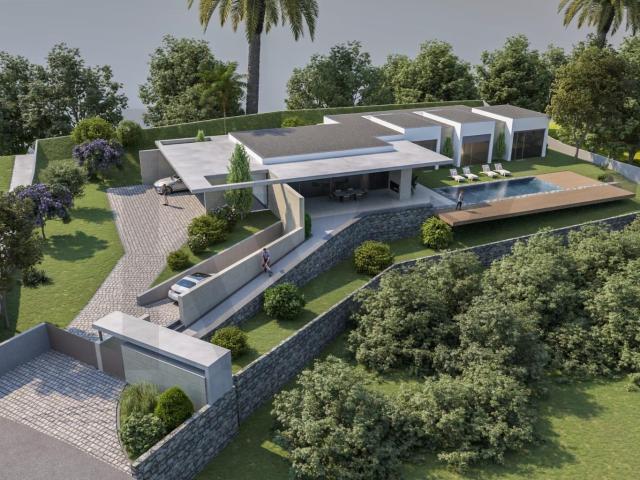 Terreno com projeto aprovado para moradia T3 com vista sobre a baía do Porto da Cruz