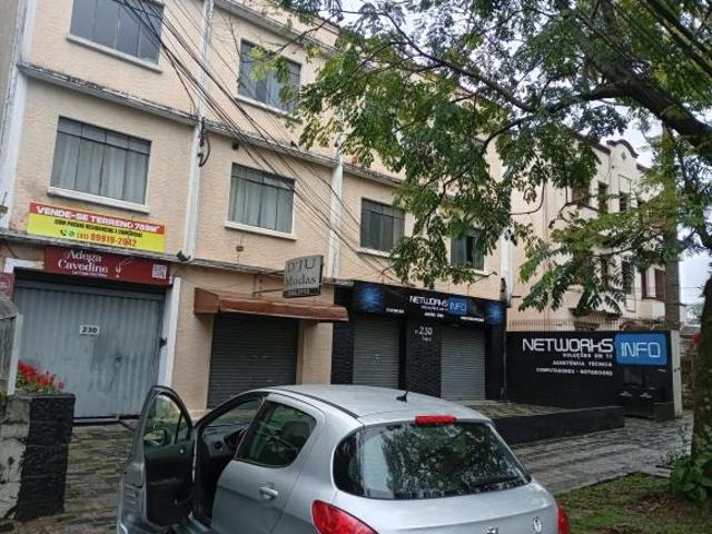 Terreno com prédio comercial e residencial