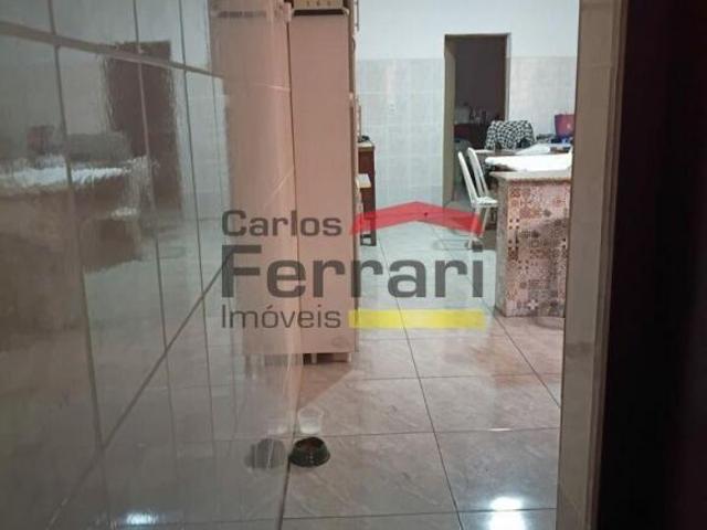 TERRENO COM SOBRADO NO JARDIM MODELO/JAÇANÃ COM 4 DORMITÓRIOS, QUINTAL E 2 VAGAS DE GARAGEM