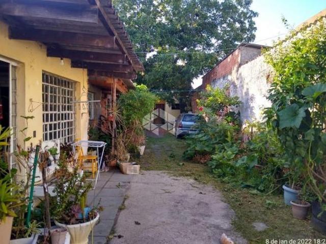 Terreno composto por 3 imóveis no bairro Aberta dos Morros