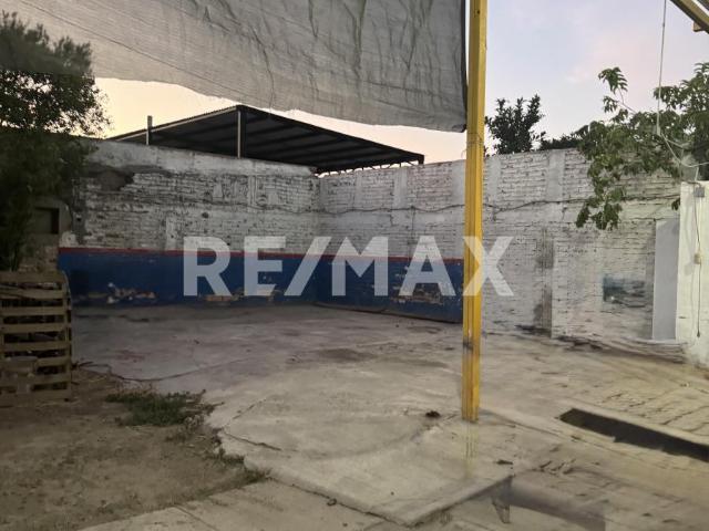 Terreno con Tejado en Venta con Infraestructura y Servicios