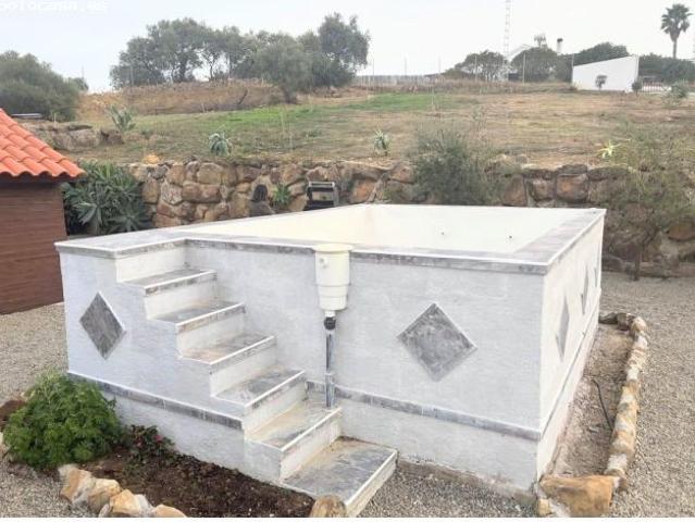 Terreno con casa de madera en Tollox, Malaga