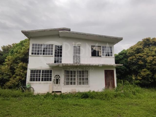 TERRENO CON CASA EN OBRA GRIS EN JUANA MOZA