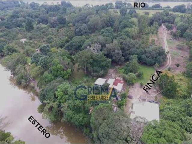 TERRENO CON CASA EN VENTA EN JUANA MOZA FRENTE AL ESTERO