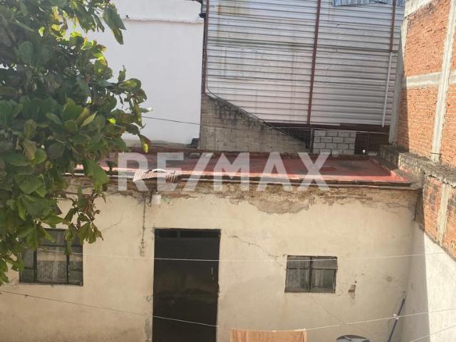 Terreno con construccion