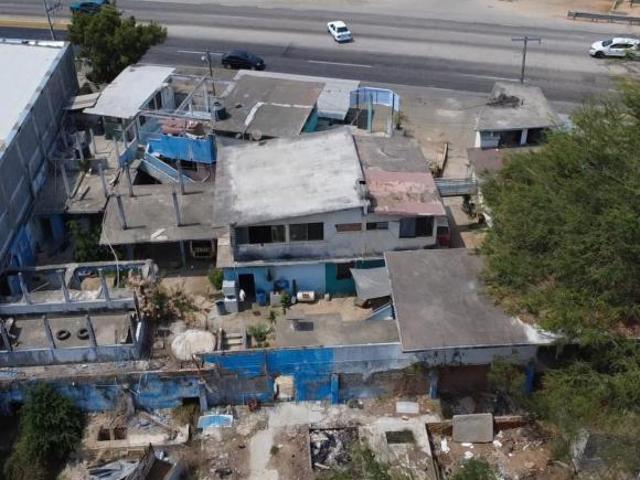 Terreno con construcción en carretera Cayaco San Marcos a la altura de El Metlapil