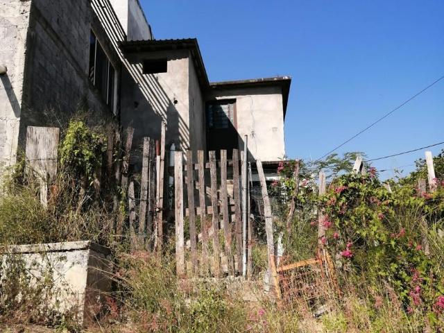 Terreno con construccion en venta