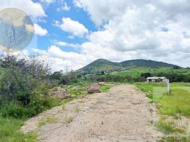 Terreno con frente a carretera