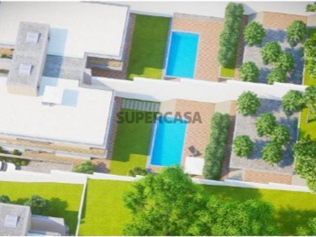 Terreno de Luxo em Almargem do Bispo: Construa a sua Moradia de Sonho com Vista e Piscina
