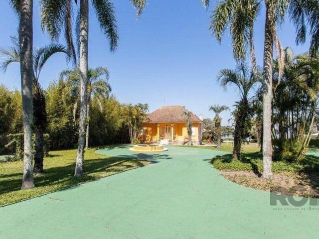 Terreno de 5.200m², rodeado pela natureza, possuindo 482m² de área construída