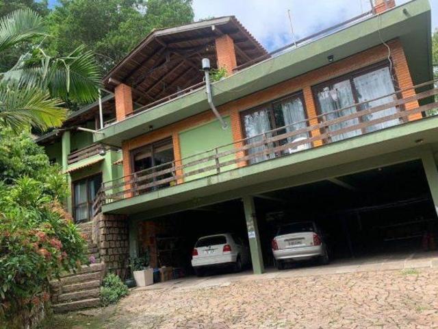 Terreno de 5.280 m², com 3 casas, no bairro Ponta Grossa, em Porto Alegre