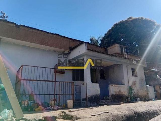 TERRENO EXTENSO COM 3 MORADIAS CONSTRUIDAS