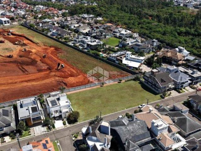 Terreno em condomínio, com 450 m² privativo, bairro Marechal Rondon Canoas