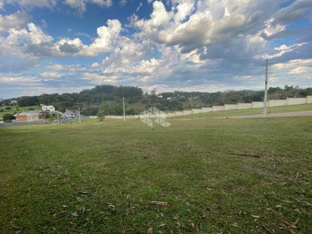 TERRENO EM CONDOMÍNIO FECHADO 300m²