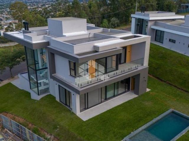 Terreno em condomínio fechado com 1.320m² no Ecovillage Urban Resort, Viamão