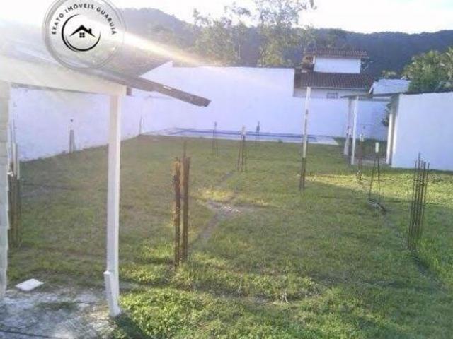 Terreno em condomínio fechado na praia da Enseada. Excelente localização
