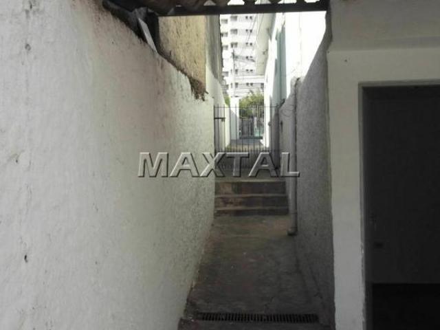 Terreno em Santa Terezinha com 228m², possui 3 casas com 127m² de área construída