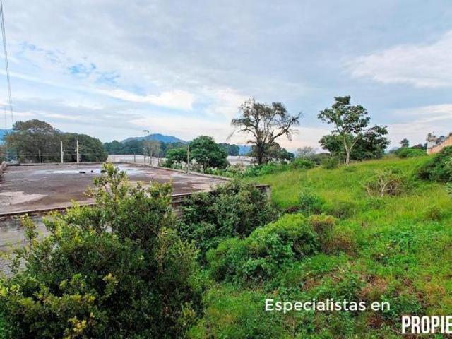 TERRENO EN HUAUCHINANGO CON CONSTRUCCIÓN ENORME
