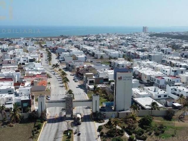 Terreno en Venta a unos pasos de la playa en Priv. Lomas del Sol con grandes amenidades