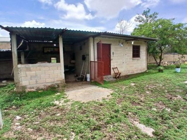 Terreno en venta Jardines de Tahdzibichen