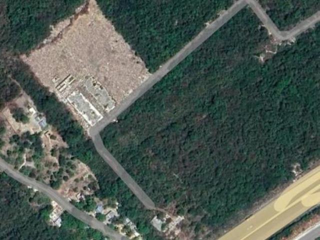 TERRENO EN VENTA EN PUERTO AVENTURAS | 9,420 M² A 100 M DE LA CARRETERA FEDERAL