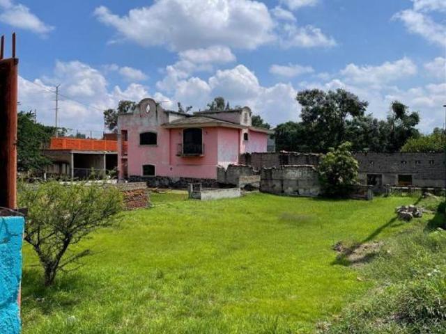 Terreno en venta sobre carretera Aeropuerto GDL con dos frentes, regular, ideal para hotel