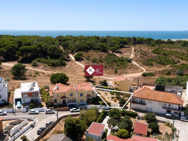 Terreno encostado zona protegida + falésia