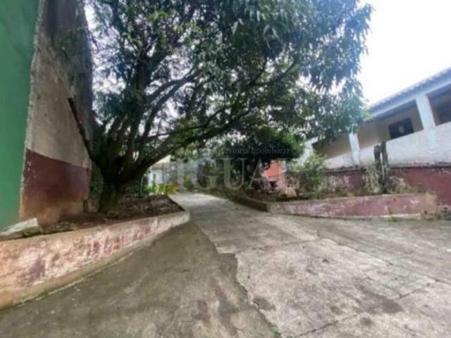 Terreno Plano com Casa antiga Habitável Ótima Localização Medindo 10X30 totalizando 300m²