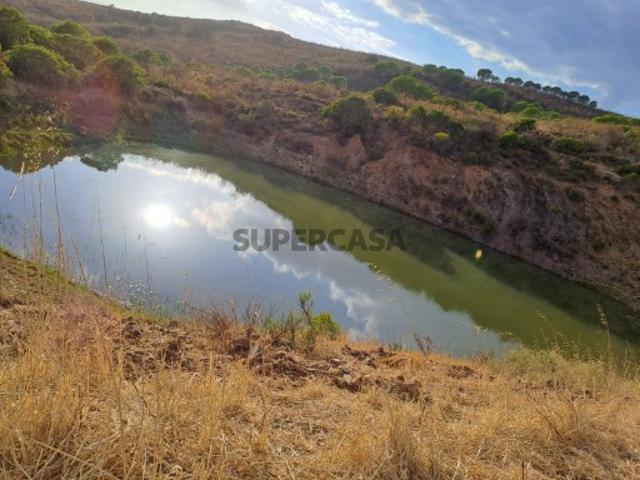 Terreno rústico com barragem com 23.120 m2 em Vale Bravo Vale Fuzeiros São Bartolomeu de Messines