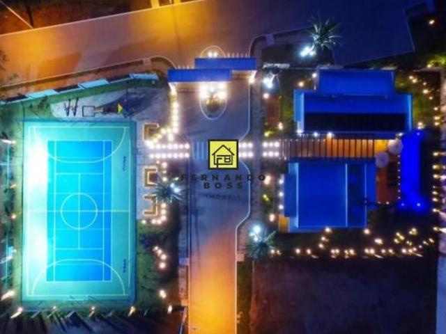 Terreno situado em um condomínio com portaria 24 horas, piscina, churrasqueira, jardim e quadra de e