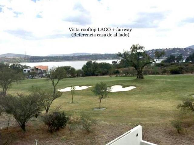 terreno sobre fairway a 1 min casa club con vista al lago AMANALI country club