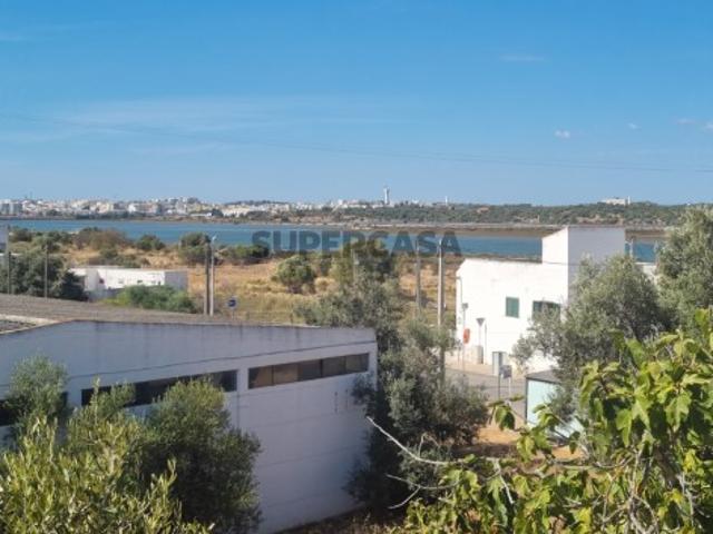 Terreno urbano com projeto para 4 moradias Estômbar Lagoa
