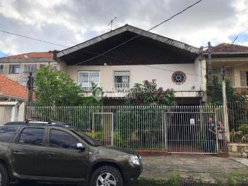 Terreno 10x35 com casa no Bairro Cristo Redentor